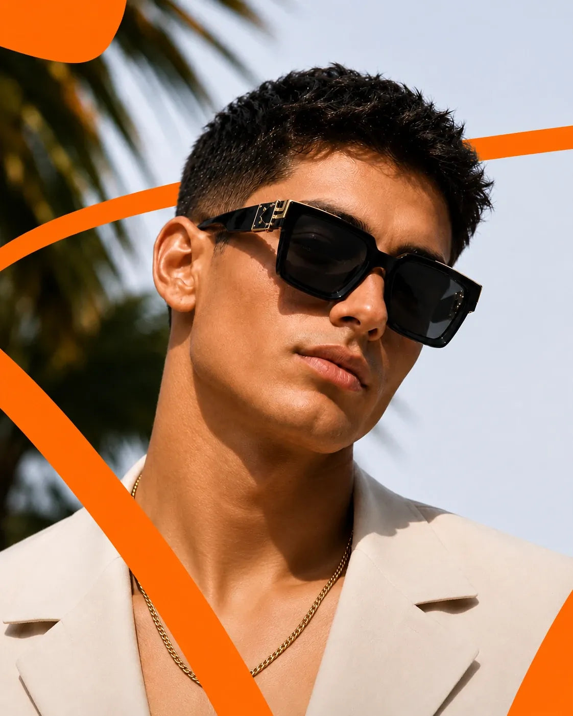 Man in black square sunglasses with orange shapes