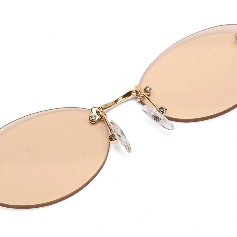 Quasar Gold Small Rim Less Oval Sunglasses for Women — Hashtag Eyewears